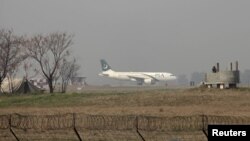 Immigration authorities in Pakistan arrest three Afghan women before they were boarded a Pakistan International Airline (PIA) flight to London using fake British passports.