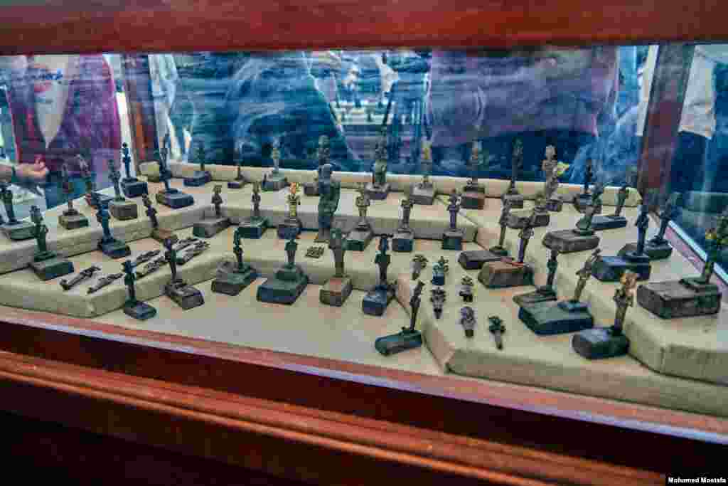 Among the findings are 73 bronze statuettes depicting god Osiris. (H. Elrasam/VOA) 
