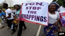 Des femmes participent à une marche de protestation contre les victimes d'attaques violentes, Lagos, Nigeria, 22 mai 2018.