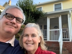 Patrick and Francine Harrington in front of their Washington-area rental home, Dec. 26, 2019. (Photo by Patrick Harrington)