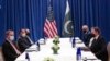 FILE - Pakistani Foreign Minister Shah Mahmood Qureshi, left, meets with US Secretary of State Antony Blinken, right, on the sidelines of the 76th UN General Assembly, Sept. 23, 2021, in New York.