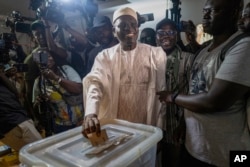 FILE—Ruling party candidate Khalifa Sall casts his vote in Dakar, Senegal, March 24, 2024.