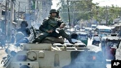 Sri Lankan soldiers patrol in Jaffna, about 300 kilometers (186 miles) northeast of Colombo, Sri Lanka, June 21, 2006 file photo