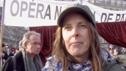 Paris Opera worker Shirley Coquaire fears she will have to retire later for less pension money under President Emmanuel Macron's reforms, in Paris, Jan. 24, 2020. (Lisa Bryant/VOA)