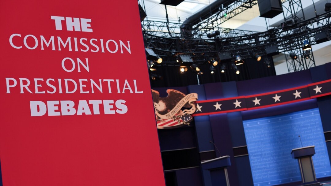 Workers prepare for the first presidential debate between U.S. President Trump and Democratic nominee Biden in Cleveland, Ohio