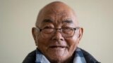 Kanchha Sherpa speaks to Associated Press during an interview at his home in Kathmandu, Nepal, Saturday, March 2, 2024. (AP Photo/Niranjan Shrestha)