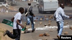 Opposition party supporters clash with police in Harare, Zimbabwe, Aug. 26, 2016. Rallies against the autocratic rule of President Robert Mugabe have intensified in recent weeks.