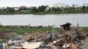 A view of the floating houses being demolished in Prek Pra commune, Chbar Ampov district, Phnom Penh, June 12, 2021. (Vicheika Kann/VOA)