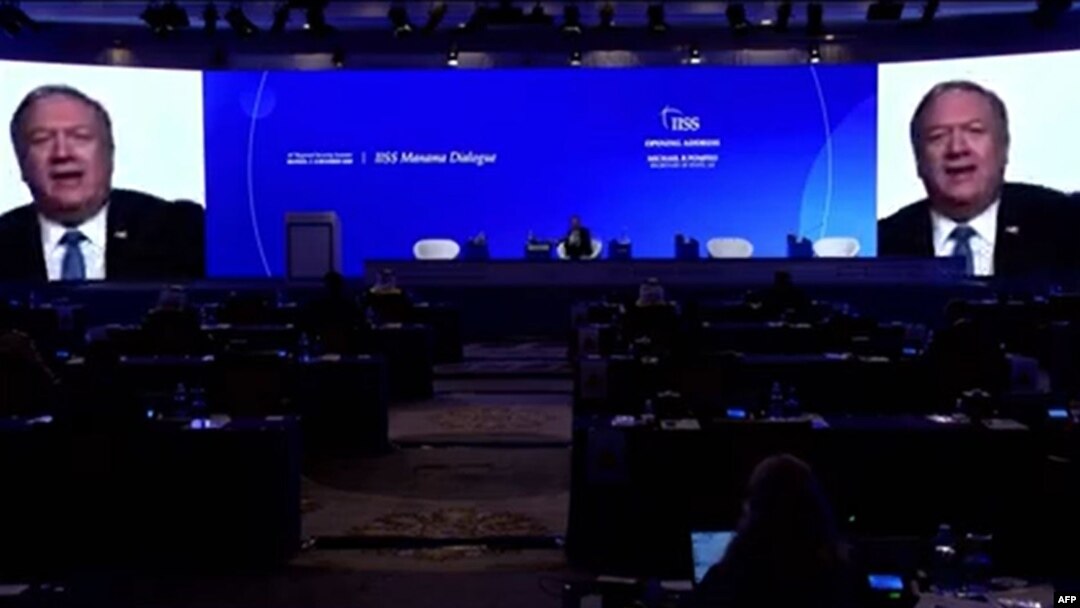 In this still image from a State Department video, U.S. Secretary of State Mike Pompeo delivers a virtual speech to the Manama Dialogue conference on regional security being held in Manama, Bahrain, on Dec. 4, 2020. 