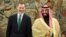 Saudi Arabia's Crown Prince Mohammed bin Salman laughs with Spain's King Felipe at the Zarzuela Palace outside Madrid, Spain, Apr. 12, 2018. 