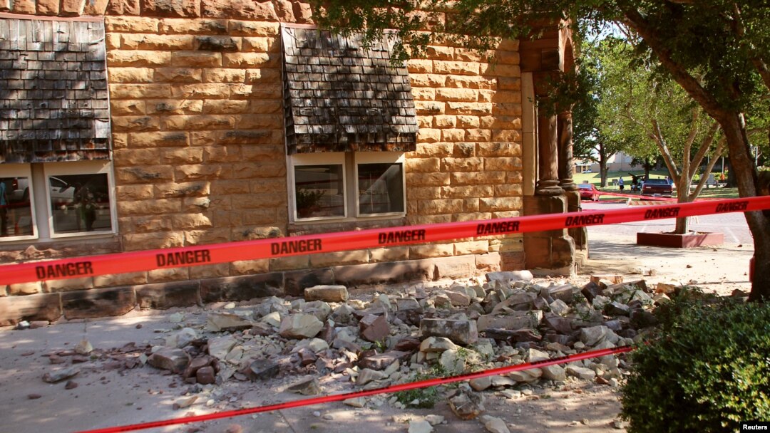 Stonework litters the sidewalk outside an empty jewelry store at the corner of Sixth and Harrison in Pawnee, Oklahoma, after a 5.6 magnitude earthquake struck near the north-central Oklahoma town, Sept. 3, 2016.