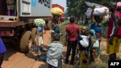 Une famille fuyant les affrontements à Bangui en RCA pour rejoindre le Cameroun. Fev. 22, 2014. 