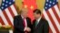 美国总统特朗普和中国国家主席习近平2017年11月9日在北京人大会堂握手。