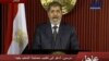 Egypt's Morsi Promises Dialogue, Keeps Extra Powers 