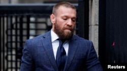 Irish mixed martial arts fighter Conor McGregor arrives at court for a civil trial on allegations against him of sexual assault, in Dublin, Nov. 19, 2024.