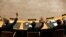 FILE - Members of the United Nations Security Council vote to tighten sanctions on North Korea at the United Nations Headquarters in New York, March 7, 2013. 