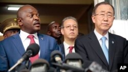 U.N. Secretary-General Ban Ki-moon, right, listens as Burundi's President Pierre Nkurunziza speaks during a joint press conference in Bujumbura, Burundi, Feb. 23, 2016. 