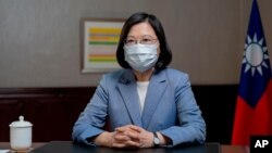 In this photo released by the Taiwan Presidential Office, Taiwan's President Tsai Ing-wen speaks at the presidential office in Taipei, Taiwan, June 20, 2021.