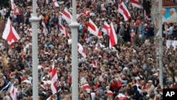 Thousands of people gather for a protest at the Independence square in Minsk, Belarus, Sunday, Aug. 23, 2020. Demonstrators are taking to the streets of the Belarusian capital and other cities, keeping up their push for the resignation of the nation…