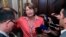 FILE - Sen. Lisa Murkowski, R-Alaska, talks with reporters after the confirmation vote of Supreme Court nominee Brett Kavanaugh, on Capitol Hill, Oct. 6, 2018 in Washington.