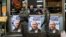 Israeli border police officers stand guard next to posters depicting Israeli Prime Minister Benjamin Netanyahu at the Ha'tikva market in Tel Aviv, Israel, April 2, 2019. 