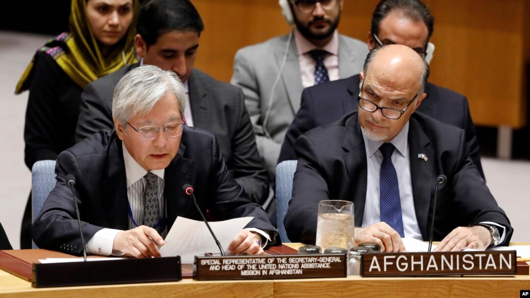 United Nations envoy for Afghanistan Tadamichi Yamamoto, left, addresses the United Nations Security Council, at U.N. headquarters, Monday, Sept. 17, 2018.