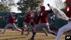 Members of Cuba's national baseball team take part in a training session in San Jose de las Lajas, Mayabeque province, Cuba, March 17, 2016. 