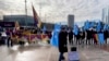 资料照片：支持藏人和维吾尔人的活动人士在瑞士日内瓦联合国办事处外抗议他们认为不公平的中国政府政策。(2024年1月23日)