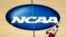 FILE - Wisconsin's Traevon Jackson dribbles past the NCAA logo during practice at the NCAA men's college basketball tournament in Anaheim, Calif., March 26, 2014. 