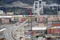 FILE - A general view of the collapsed Morandi Bridge in the port city of Genoa, Italy, February 7, 2019.