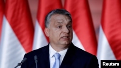 FILE - Hungarian Prime Minister Viktor Orban speaks at a campaign event in Budapest, Hungary, June 27, 2017.