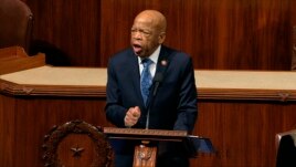 FILE - Democratic Congressman John Lewis speaks as the House of Representatives debates the articles of impeachment against President Donald Trump, at the Capitol, in Washington, Dec. 18, 2019.