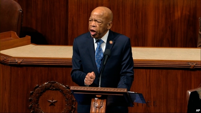 FILE - Democratic Congressman John Lewis speaks as the House of Representatives debates the articles of impeachment against President Donald Trump, at the Capitol, in Washington, Dec. 18, 2019.