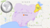 Blasts kill at least 18 in Nigeria; authorities suspect suicide bombers 