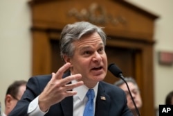 FILE - FBI Director Christopher Wray testifies before the House Judiciary Committee on Capitol Hill, Feb. 5, 2020 in Washington.