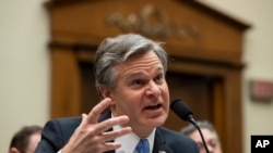 FILE - FBI Director Christopher Wray testifies during an oversight hearing of the House Judiciary Committee, on Capitol Hill, February 5, 2020 in Washington.