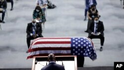 The Rev. Darryl Caldwell speaks as the casket of the late Rep. John Lewis, D-Ga., lies in repose during a service celebrating "The Boy from Troy" at Troy University, July 25, 2020, in Troy, Ala. Lewis died July 17, 2020.