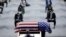 The Rev. Darryl Caldwell speaks as the casket of the late Rep. John Lewis, D-Ga., lies in repose during a service celebrating "The Boy from Troy" at Troy University, July 25, 2020, in Troy, Ala. Lewis died July 17, 2020.