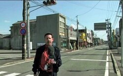 FILE - VOA's Steve Herman reporting from Namie, near the Fukushima Daiichi nuclear power plant in 2011.
