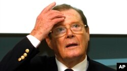 British actor and UNICEF ambassador Roger Moore, speaks at a press conference in Vienna, Austria, Nov. 13, 2010. Moore died Tuesday in Switzerland at 89.