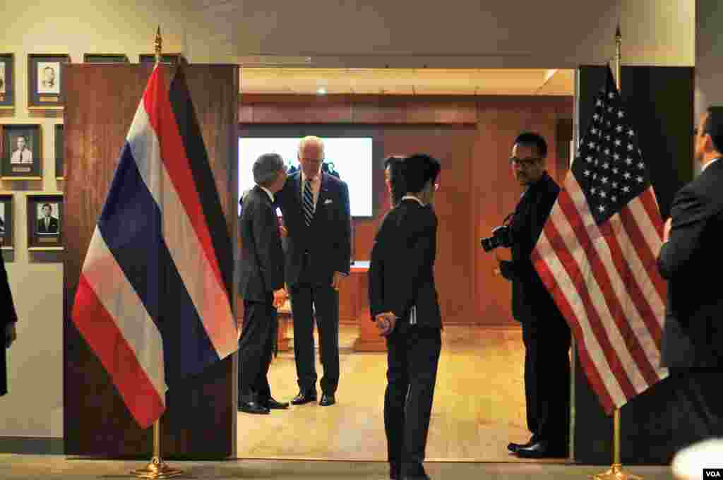 Vice President Joe Biden signs a book of condolences for His Majesty King Bhumibol Adulyadej