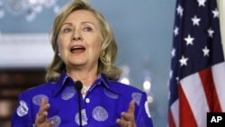 Secretary of State Hillary Rodham Clinton gestures while speaking at the State Department in Washington, Monday, July 11, 2011, during her meeting with European Union High Representative Catherine Ashton. (AP Photo/Jacquelyn Martin)