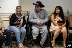 FILE - Exiled Pedro Gutierrez, who was released from a Nicaraguan jail and rendered "stateless" waits for the start of a religious service, in Guatemala City, Sept. 22, 2024.