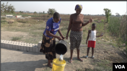 Most residents in the township of Kuwadzana on the west side of Harare rely on open water sources, Sept. 23, 2019. (C.Mavhunga/VOA)