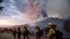 FILE - Firefighters during a wildfire in Yucaipa, Calif., Sept. 5, 2020. 