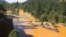 Aguas tóxicas cambian el color del río Ánimas en el Condado La Plata, estado de Colorado.
