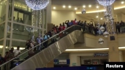 FILE: Shoppers are at the opening of a Game discount store at a shopping mall in Umhlanga, KwaZulu-Natal, Durban, South Africa on Nov. 24, 2017. FRANK CHEMALY/ The Independent on Saturday/via REUTERS .