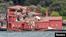 The damaged Hekimbasi Salih Efendi mansion is seen after the Maltese flagged tanker Vitaspirit crashed into it by the Bosporus strait in Istanbul, Turkey, April 7, 2018.