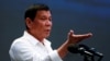 FILE - President Rodrigo Duterte speaks during a gathering in Manila, Philippines, October 13, 2016. 