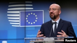 FILE - European Council President Charles Michel speaks at a news conference in Brussels, Belgium, Feb. 21, 2020. 